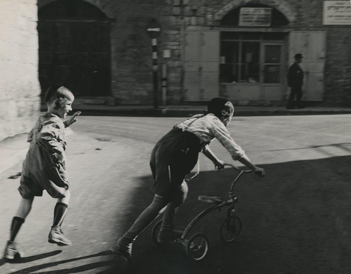 Children playing on a street of Mea Shearim, Jerusalem, Israel, 1950s Children playing on a street of Mea Shearim, Jerusalem, Israel, 1950s