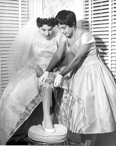 Bride preparing for her wedding, USA 1950s Bride preparing for her wedding, USA 1950s