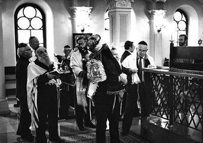 Simhat Torah at the Nozyk Synagogue, Warsaw, 1986. Photo: Jerzy Budziszewski. The Oster Visual Documentation Center, ANU - Museum of the Jewish People. Courtesy of Jerzy Budziszewski Collection, Israel
