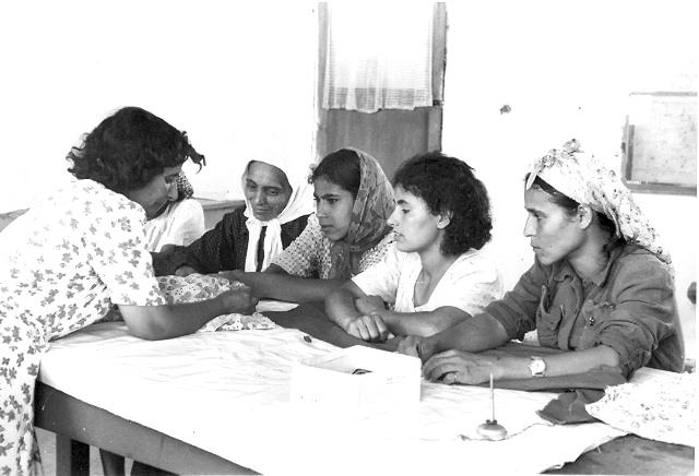 Sewing class to new immigrant women from Yemen, Israel, 1950s Sewing class to new immigrant women from Yemen, Israel, 1950s