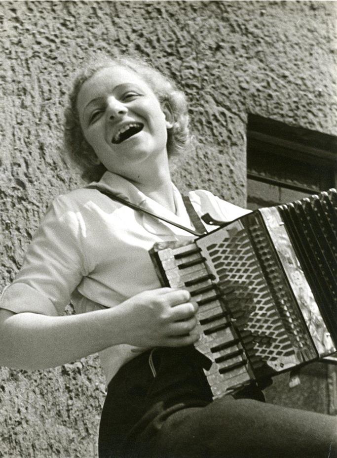 Gerit Locker playing the accordion, Berlin, Germany, 1934 Gerit Locker playing the accordion, Berlin, Germany, 1934