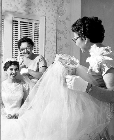Bride preparing for her wedding, USA 1950s Bride preparing for her wedding, USA 1950s